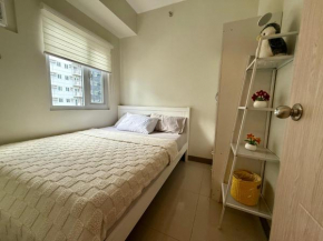Urban Oasis 2BR Condo with Multiple Pools at SMDC Charm Residences